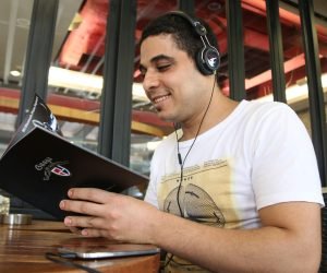 practice listening English online about read in library